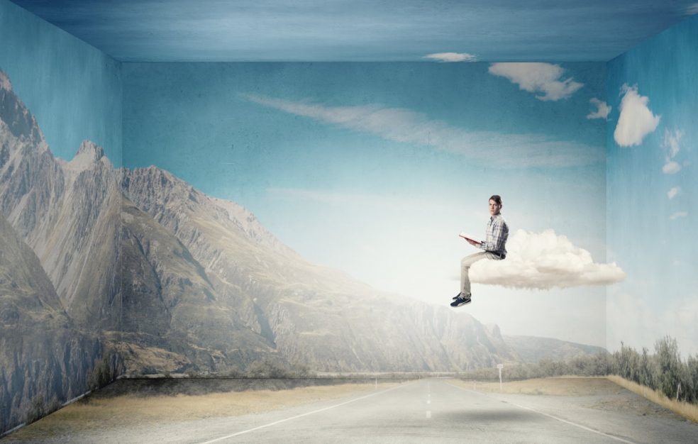 man on cloud in cube procrastinating hybrid work